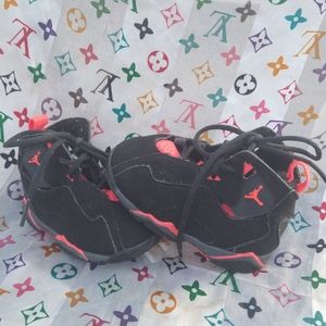 Red and black Jordans